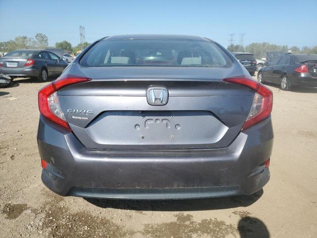 Photo 6 from auction – 2018 HONDA CIVIC LX with VIN 2HGFC2F55JH570302