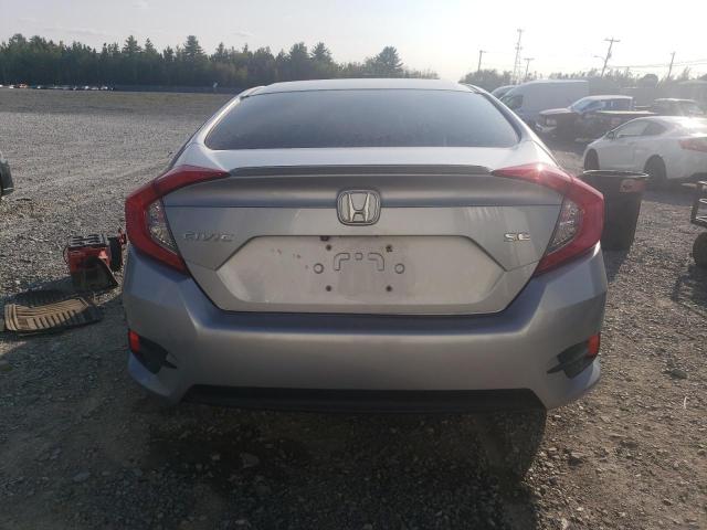 Photo 6 from auction – 2018 HONDA CIVIC LX with VIN 2HGFC2F66JH019191