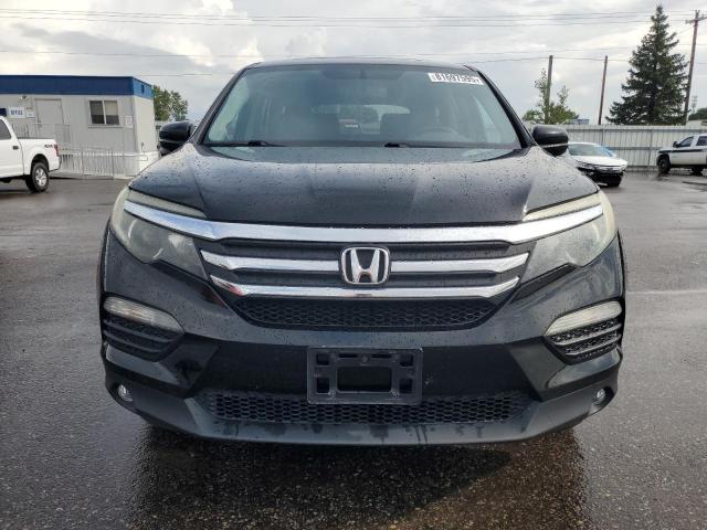 Photo 5 from auction – 2017 HONDA PILOT EXLN with VIN 5FNYF6H71HB067418