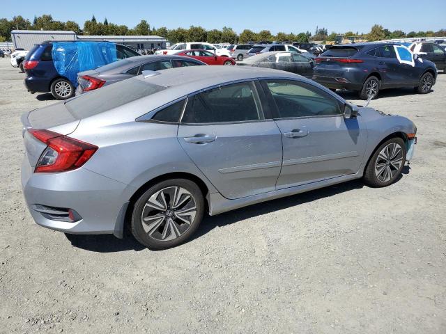 Photo 3 from auction – 2018 HONDA CIVIC EX with VIN JHMFC1F36JX038896