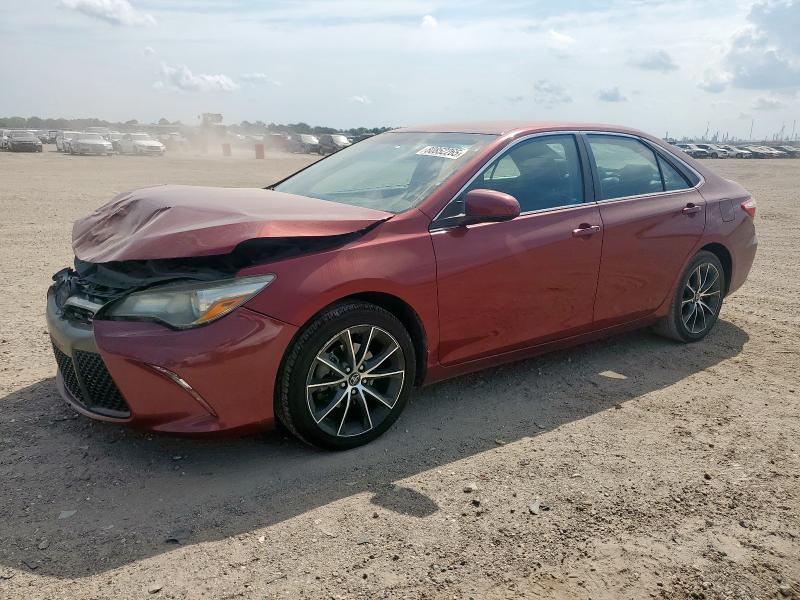 TOYOTA CAMRY LE 2017 with VIN 4T1BF1FK1HU650011 - Photo from auction