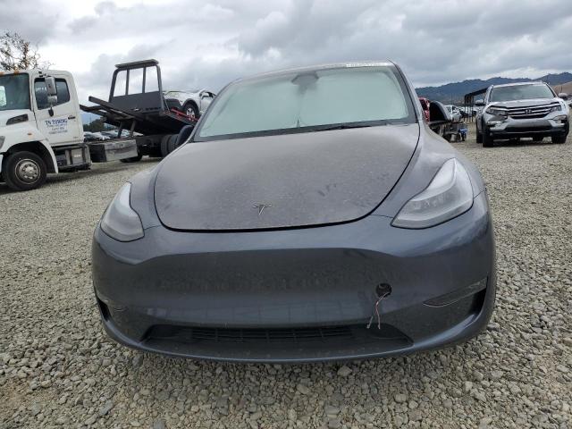 Photo 5 from auction – 2023 TESLA MODEL Y with VIN 7SAYGDEF0PF889285