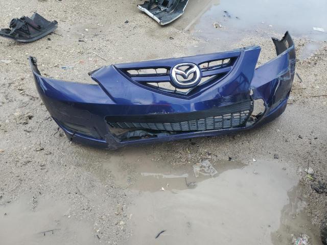 Photo 12 from auction – 2005 MAZDA 3 with VIN JM1BK323051238220
