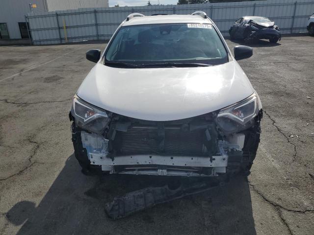 Photo 5 from auction – 2018 TOYOTA RAV4 LE with VIN JTMBFREV9JJ258707