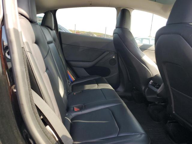 Photo 11 from auction – 2023 TESLA MODEL Y with VIN 7SAYGDEE6PA181160