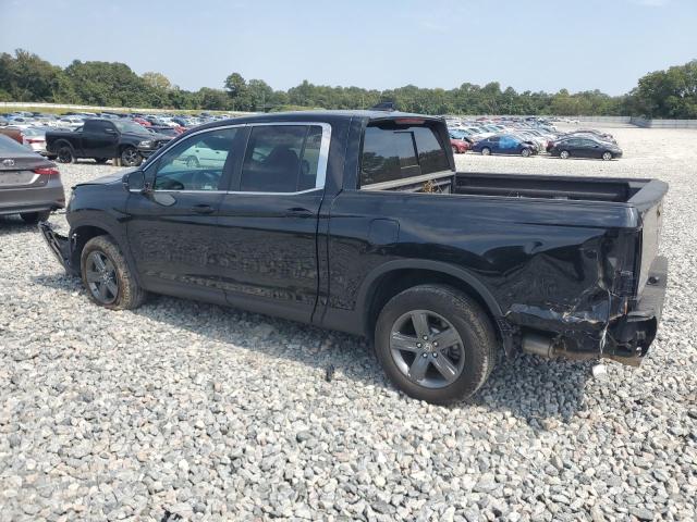 Photo 2 from auction – 2023 HONDA RIDGELINE with VIN 5FPYK3F50PB047646
