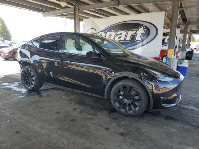 Photo 4 from auction – 2022 TESLA MODEL Y with VIN 7SAYGDEE3NF554235