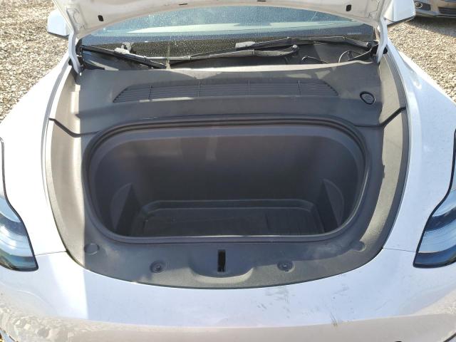 Photo 12 from auction – 2023 TESLA MODEL Y with VIN 7SAYGDEE0PA128681