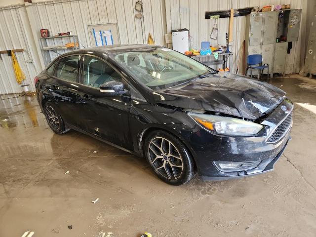 Photo 4 from auction – 2017 FORD FOCUS SEL with VIN 1FADP3H29HL210987