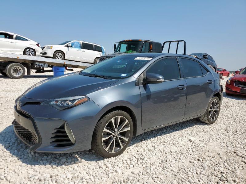 TOYOTA COROLLA L 2017 with VIN 5YFBURHE0HP601623 - Photo from auction
