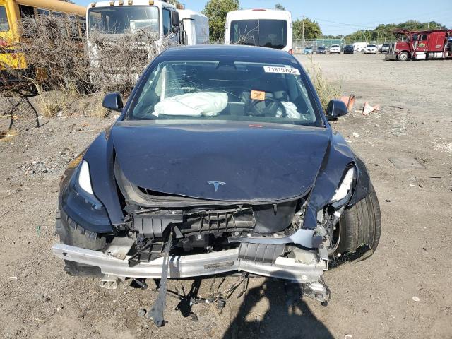 Photo 5 from auction – 2022 TESLA MODEL 3 with VIN 5YJ3E1EA9NF287353