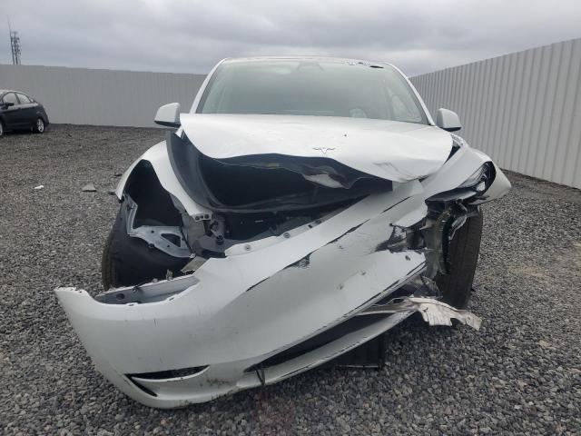 Photo 5 from auction – 2023 TESLA MODEL Y with VIN 7SAYGDEE7PF661825