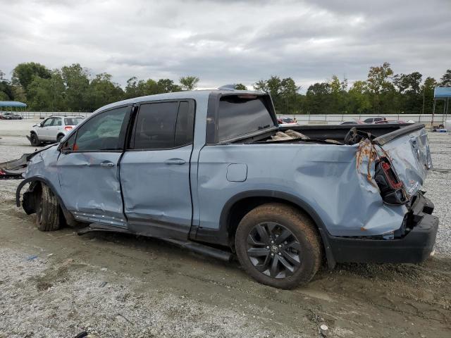 Photo 2 from auction – 2023 HONDA RIDGELINE with VIN 5FPYK3F15PB050958