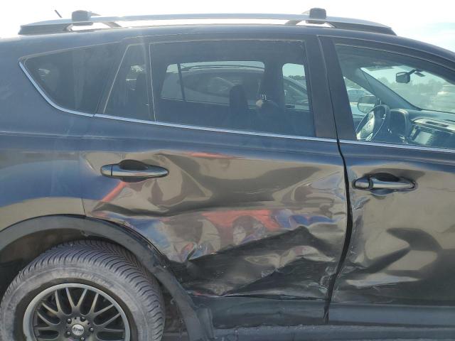 Photo 11 from auction – 2015 TOYOTA RAV4 LE with VIN 2T3BFREV8FW317075