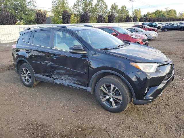 Photo 4 from auction – 2017 TOYOTA RAV4 XLE with VIN 2T3RFREV7HW682235
