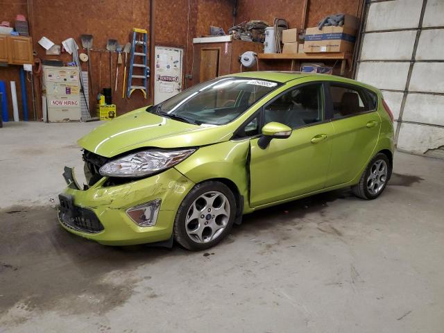 FORD FIESTA SES 2011 with VIN 3FADP4FJ6BM124820 - Photo from auction