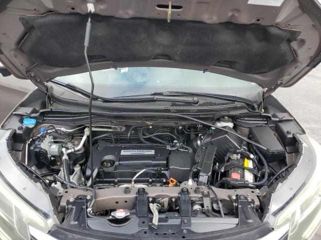 Photo 11 from auction – 2015 HONDA CR-V with VIN 2HKRM3H55FH504522