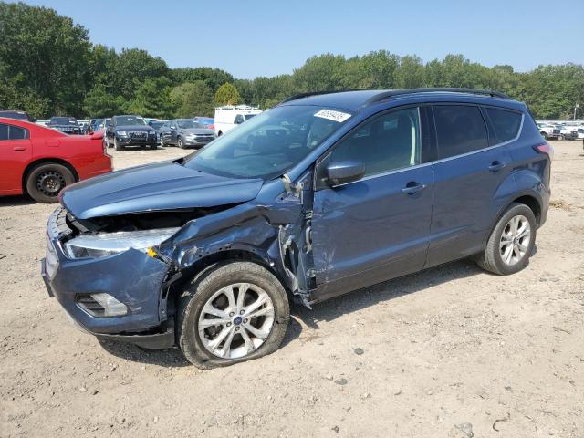 FORD ESCAPE SE 2018 with VIN 1FMCU9GD6JUB38758 - Photo from auction
