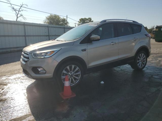 FORD ESCAPE TIT 2017 with VIN 1FMCU0JD3HUC09297 - Photo from auction