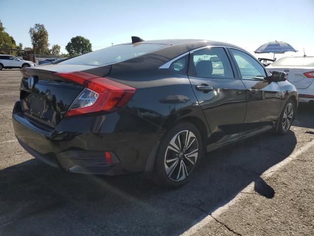 Photo 3 from auction – 2016 HONDA CIVIC EXL with VIN 2HGFC1F76GH657663