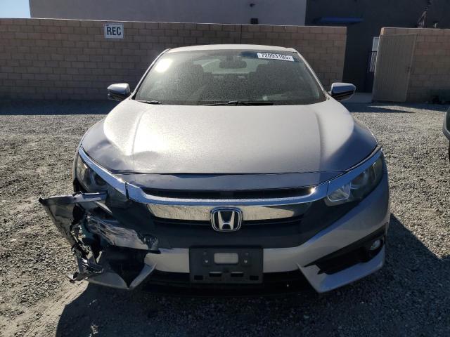 Photo 5 from auction – 2018 HONDA CIVIC EX with VIN 2HGFC3A30JH357334