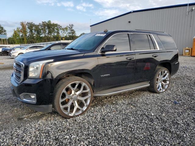 GMC YUKON SLT 2015 with VIN 1GKS2BKC5FR219938 - Photo from auction