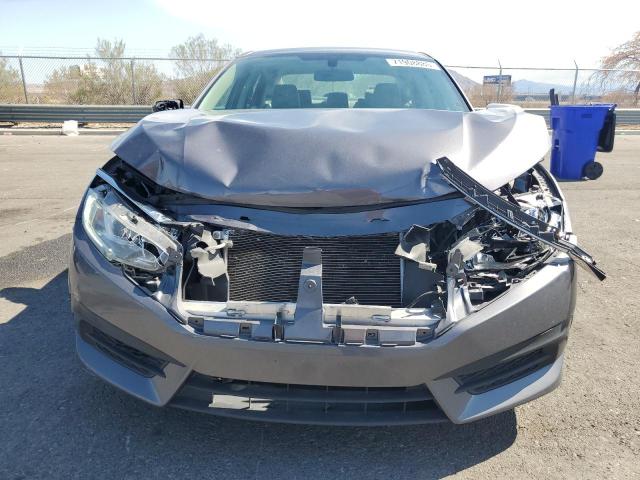 Photo 5 from auction – 2016 HONDA CIVIC LX with VIN 19XFC2F53GE007252