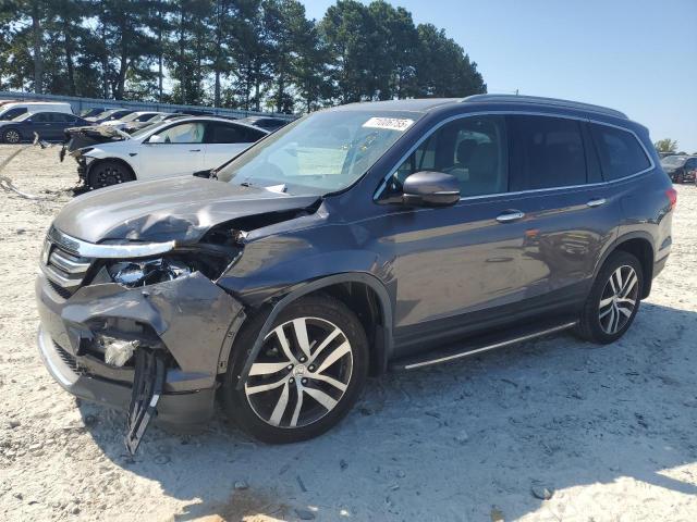 HONDA PILOT 2018 with VIN 5FNYF6H0XJB055566 - Photo from auction