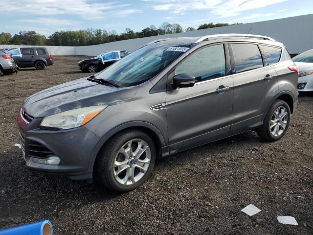 FORD ESCAPE TIT 2014 with VIN 1FMCU0JX1EUC16948 - Photo from auction