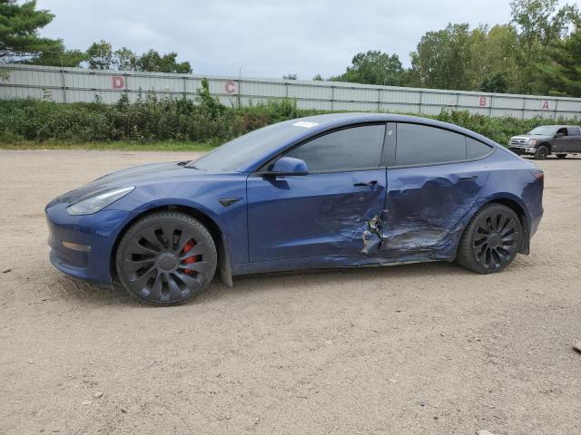 TESLA MODEL 3 2022 with VIN 5YJ3E1ECXNF321737 - Photo from auction