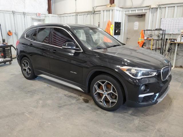 Photo 4 from auction – 2016 BMW X1 XDRIVE2 with VIN WBXHT3C38G5E49141