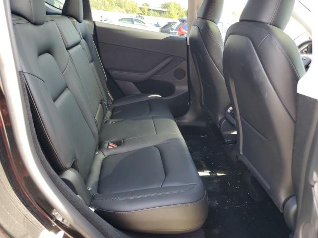 Photo 11 from auction – 2023 TESLA MODEL Y with VIN 7SAYGDEE4PF865241