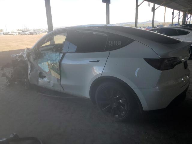 Photo 2 from auction – 2021 TESLA MODEL Y with VIN 5YJYGDED0MF132572