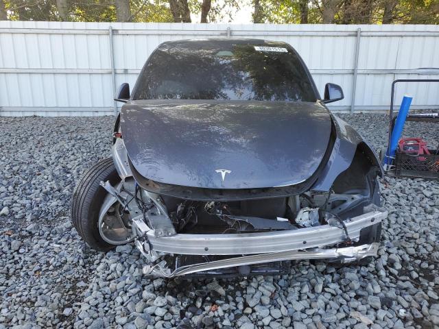 Photo 5 from auction – 2023 TESLA MODEL Y with VIN 7SAYGDEE2PA210900