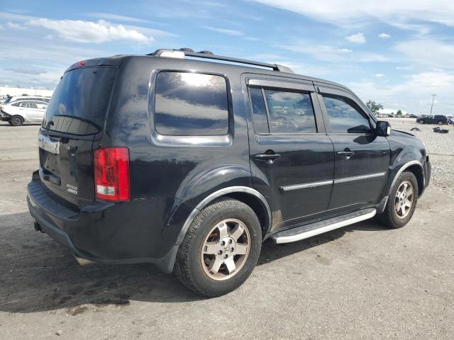 Photo 3 from auction – 2011 HONDA PILOT TOUR with VIN 5FNYF4H90BB004615