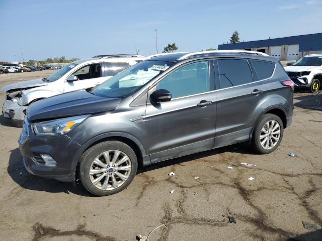FORD ESCAPE TITANIUM 2017 with VIN 1FMCU0JD6HUE92293 - Photo from auction