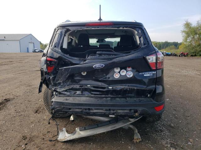 Photo 6 from auction – 2018 FORD ESCAPE TIT with VIN 1FMCU9J94JUA19319