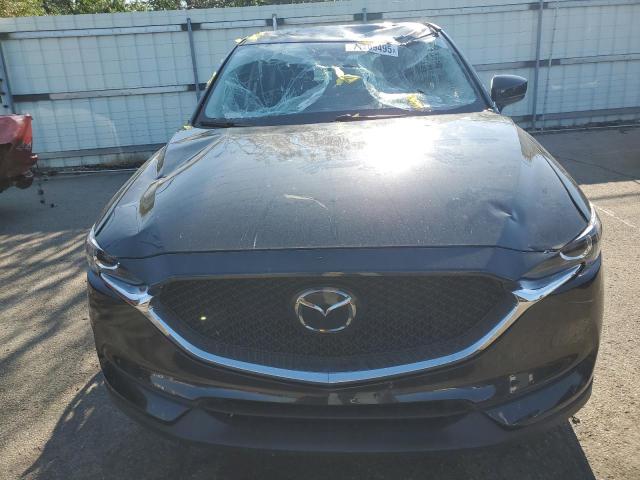 Photo 5 from auction – 2021 MAZDA CX-5 SPORT with VIN JM3KFBBM7M0351990