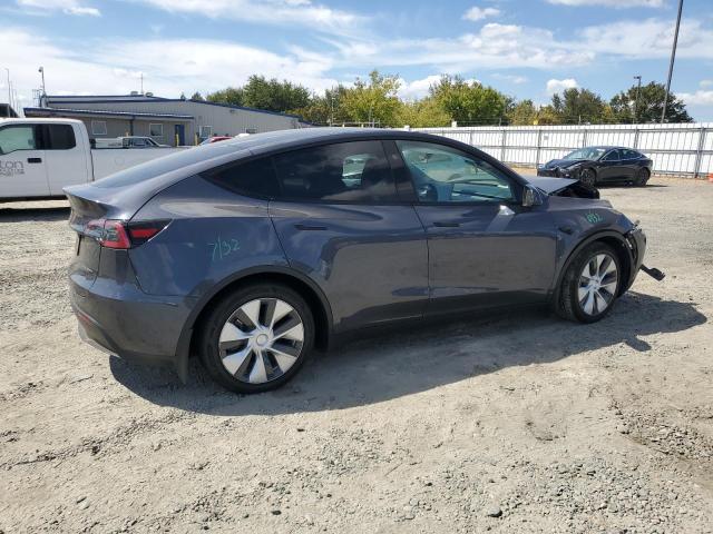Photo 3 from auction – 2023 TESLA MODEL Y with VIN 7SAYGAEE8PF972307