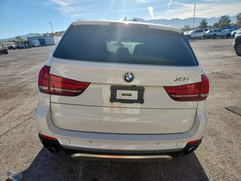 Photo 6 from auction – 2015 BMW X5 XDRIVE3 with VIN 5UXKR0C54F0P07356