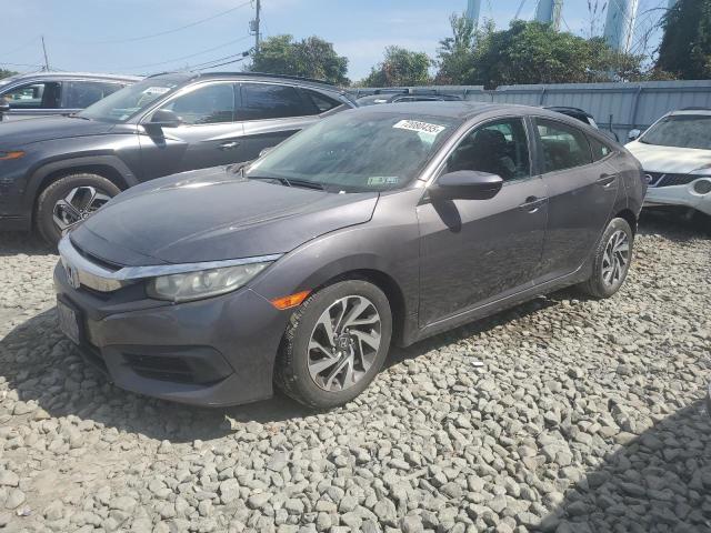 HONDA CIVIC EX 2017 with VIN 2HGFC2F70HH554357 - Photo from auction