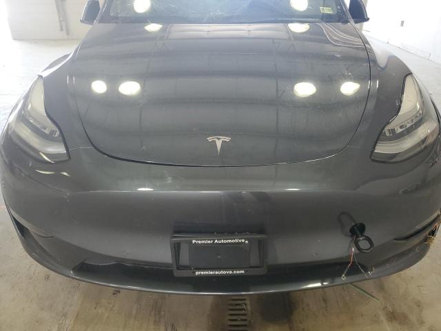 Photo 11 from auction – 2021 TESLA MODEL Y with VIN 5YJYGDED6MF124346