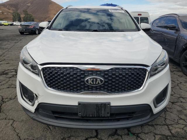 Photo 5 from auction – 2016 KIA SORENTO LX with VIN 5XYPG4A34GG002509