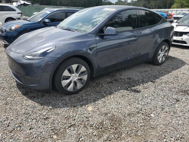 TESLA MODEL Y 2023 with VIN 7SAYGDEE4PA174997 - Photo from auction