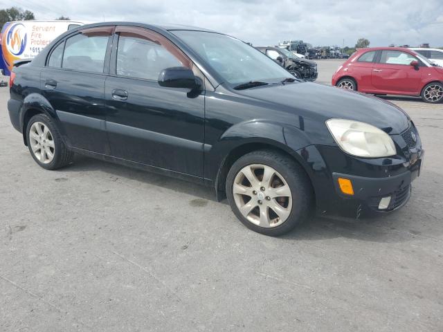 Photo 4 from auction – 2009 KIA RIO BASE with VIN KNADE223296574855