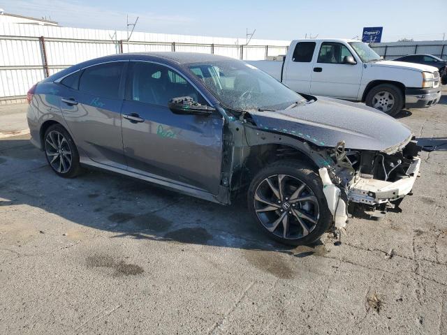 Photo 4 from auction – 2021 HONDA CIVIC SPOR with VIN 2HGFC2F81MH525937