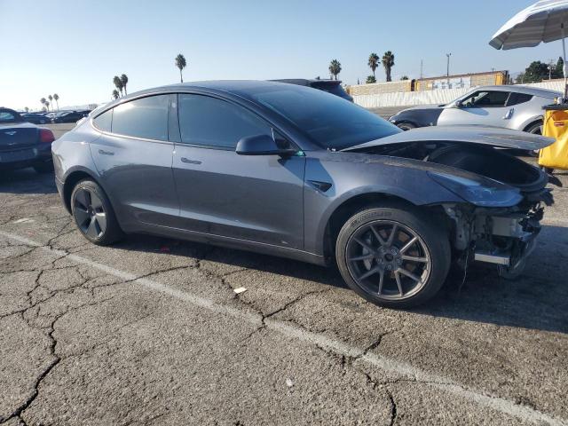 Photo 4 from auction – 2022 TESLA MODEL 3 with VIN 5YJ3E1EB3NF137005