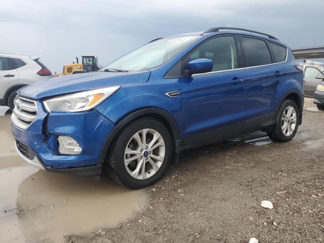 FORD ESCAPE SE 2018 with VIN 1FMCU0GD8JUA60947 - Photo from auction