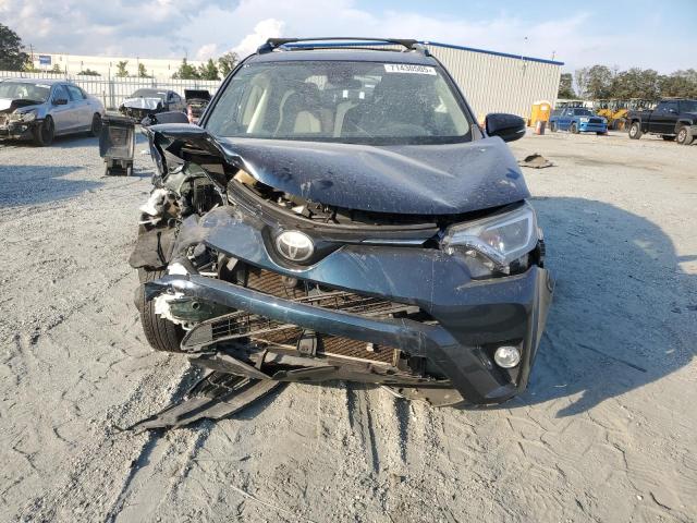 Photo 5 from auction – 2017 TOYOTA RAV4 XLE with VIN JTMWFREV8HJ109300
