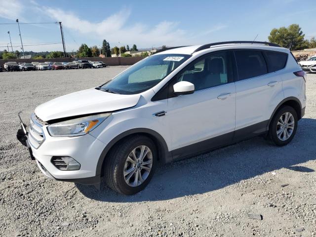 FORD ESCAPE SE 2018 with VIN 1FMCU0GD4JUC11413 - Photo from auction